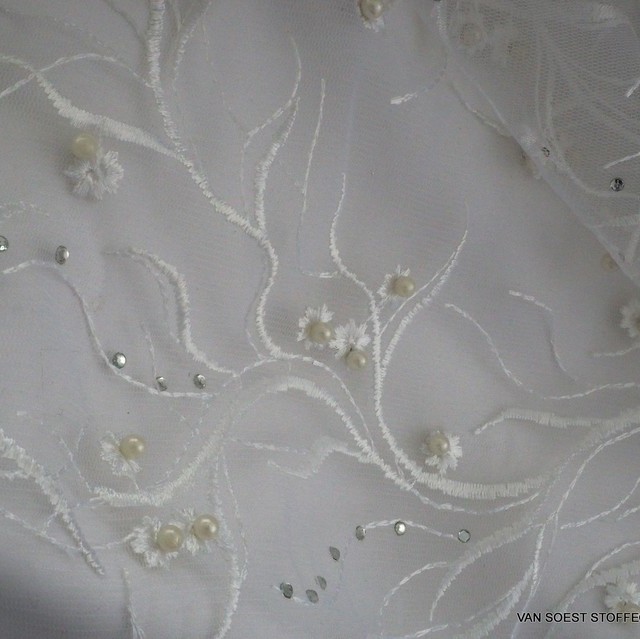 Cream colored floral lace + mini pearls + rhinestones on cream colored tulle